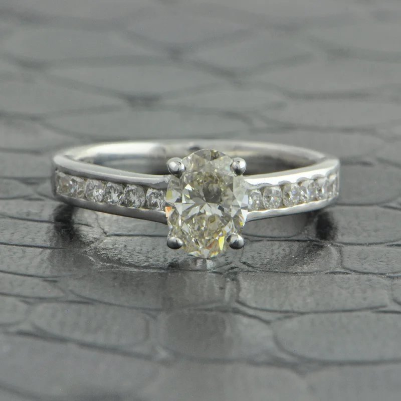 Thick gold ring-.99 ct. Oval Cut Diamond Engagement Ring in 18k White Gold