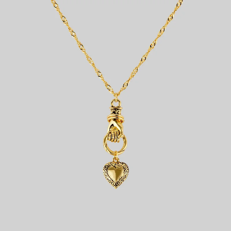 Dotted chain necklace-ALL OF ME. Hand Grasping Heart Necklace - Gold