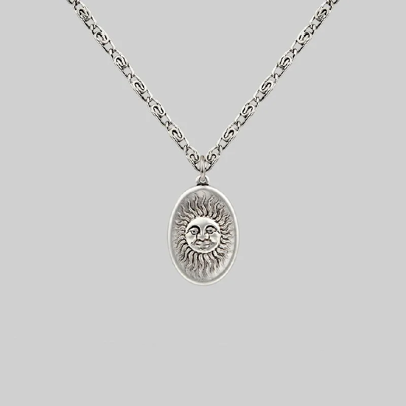 Luminous gem necklace-DAWN. Symbolic Sun Face Necklace - Silver