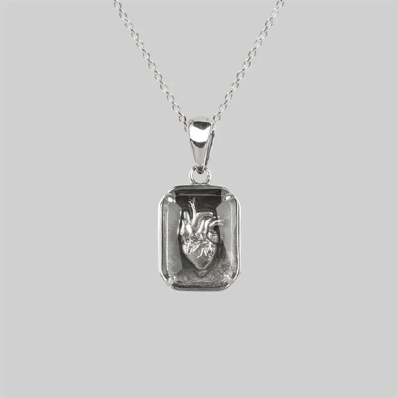 Rising ridge necklace-HEART KEEPER. Anatomical Heart Under Glass Necklace - Silver